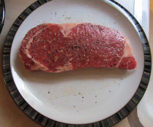 Rib-Eye, seasoned and brought to room temperature.