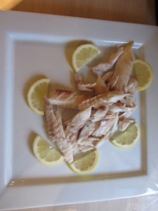 Completed fish, served with lemon.