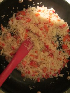 Stirring the rice until it has a nutty aroma.