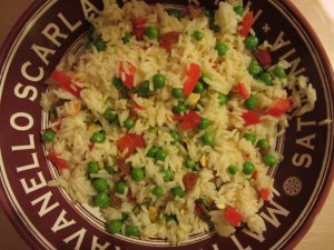 Finished pilaf with peas, golden raisins, and pistachios.