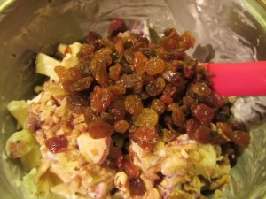 Apple mixture with walnuts and golden raisins.