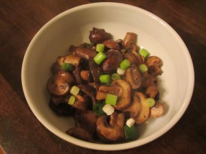 Final sauteed mushrooms with chives.