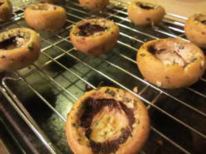 Mushrooms after baking. I forgot to turn mine upside down before I baked them, so they filled with fluid.