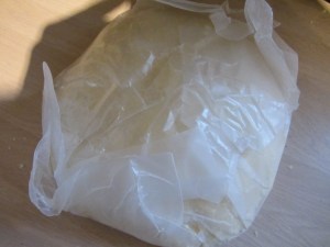 Dough wrapped to go in refrigerator.