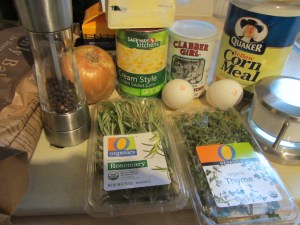 Ingredients for bread pudding:  pepper, Kosher salt, onion, creamed corn, butter, cream, eggs, baking powder, cornmeal, rosemary, thyme, and Parmesan.