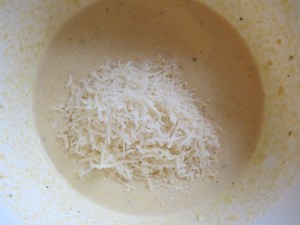 Folding in Parmesan.