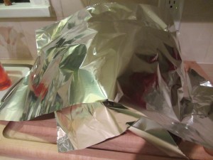 Turkey resting under foil.