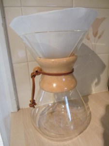 Chemex coffee maker with paper filter.