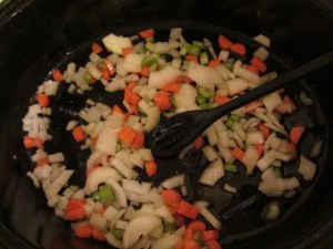 Mire poix in the roasting pan.