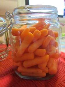 A pound of baby carrots in the jar.