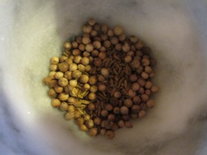 Whole coriander and cumin seeds.