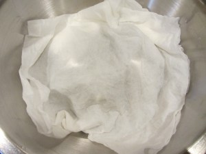 Mussels topped with a damp paper towel...