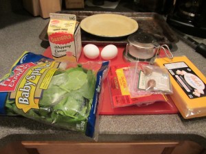 Ingredients:  frozen pie crust, spinach, cream, eggs, cheddar, cubed ham, Kosher salt, nutmeg.
