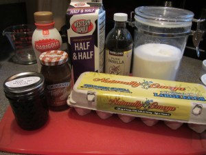Flan ingredients:  whole milk, half and half, vanilla, sugar, eggs, blueberry jam, and fat-free (doh!) caramel.