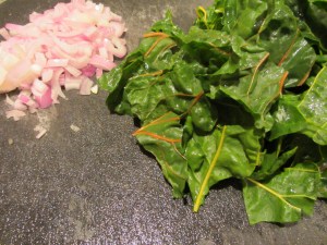 Shallots and shredded chard.
