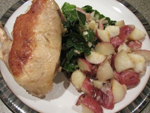 Duck, potatoes cooked in duck fat, and chard.