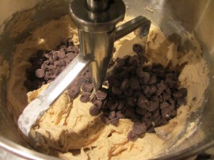 Chocolate chips being stirred in.