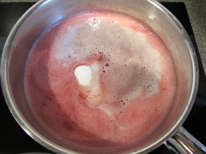 Dipping sauce, ginger ale, and sugar in a saucepan.