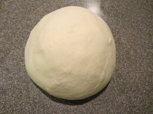 Formed into a smooth ball.