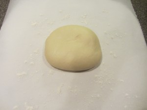 Pizza to be built on peel.