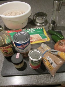 Ingredients for Alton's baked beans:  Great Northern beans, bacon, onion, Jalapenos, tomato paste, brown sugar, molasses, vegetable broth, cayenne pepper, black pepper, and Kosher salt.