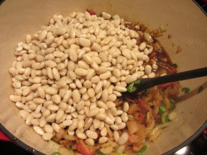 Beans added to Dutch oven.