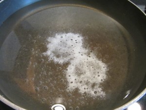Water, vinegar, and Kosher salt being brought to a simmer.