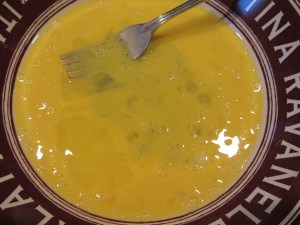 Eggs beaten with a fork.