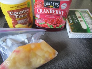 Smoothie ingredients:  frozen fruit cocktail in light syrup, lemonade mix, cranberry juice, and silken tofu.