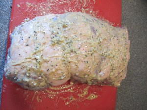 Longer piece of twine looped around the shorter pieces of twine.