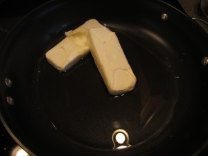 16 ounces of shortening melting in a 12-inch skillet.