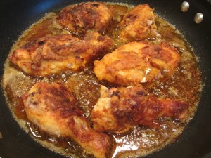 Chicken pieces flipped to second sides for ~12 more minutes.