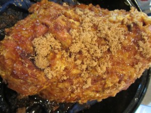 Brown sugar sprinkled on mustard.