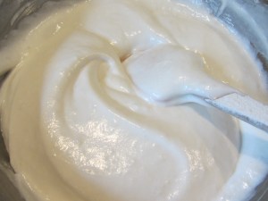 Folding in the flour mixture.