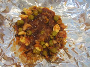 Half of the olive mixture poured in the foil pouch.