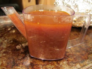 Liquid drained from foil pouch to separate fat.