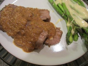 Alton's pot roast served with sauce.